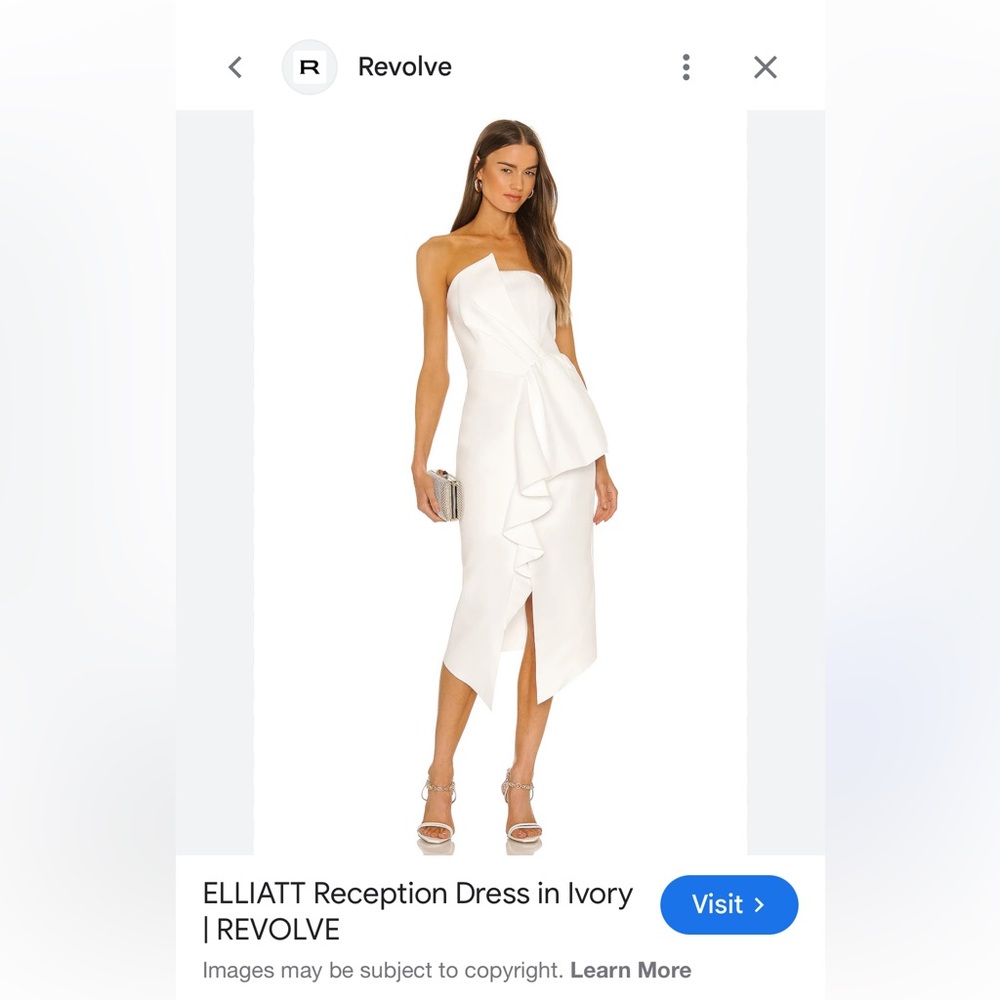 Elliatt Ivory Ruffle Midi reception Dress Large
Nully like new REVOLVE